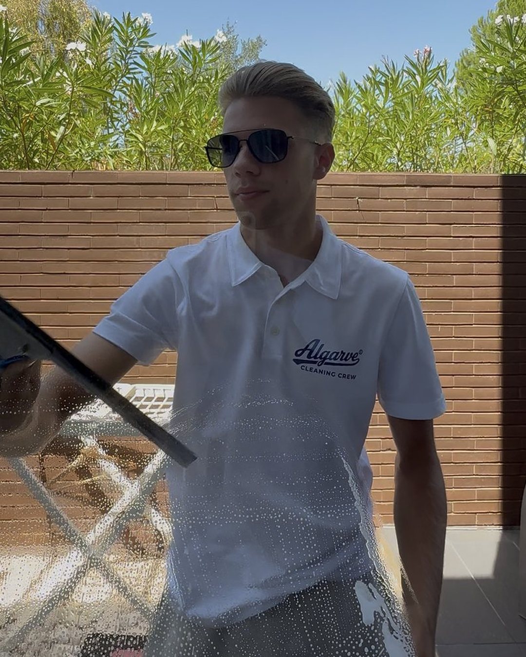 Algarve Cleaning Crew cleaning glass in Vilamoura